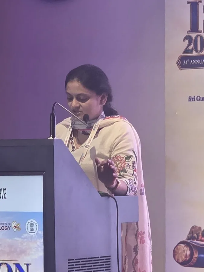 Dr. Trisha Srivastava at the ISOCON podium